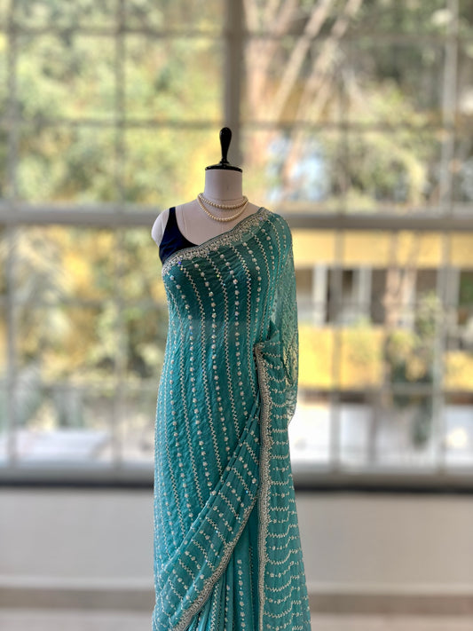 Powder blue shimmer chiffon embellished saree