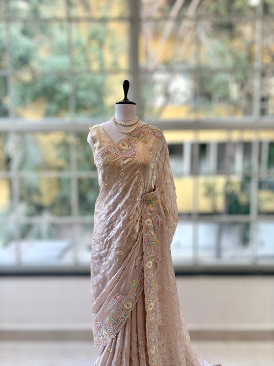 Nude fendy satin embellished saree