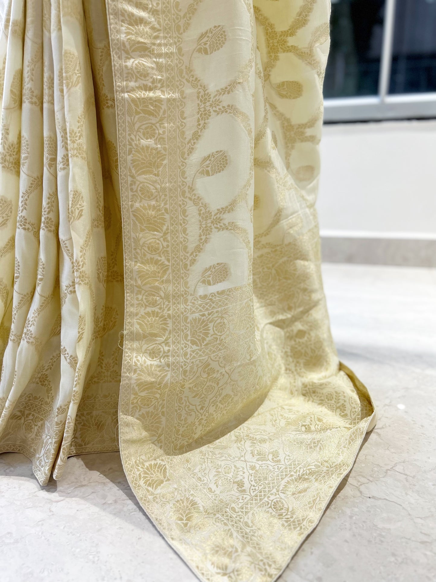 Off white pure dola silk saree