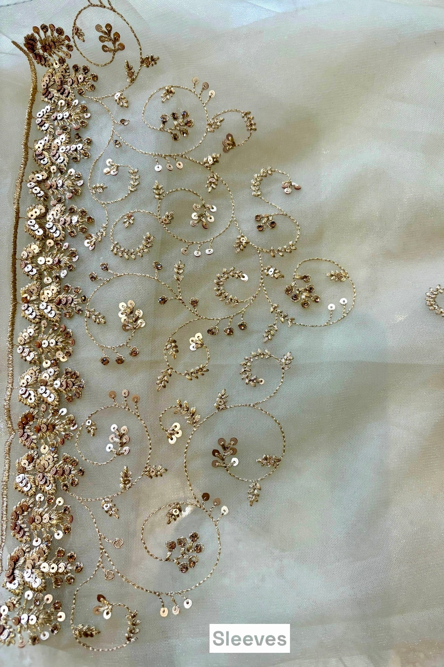 Golden sequins embellished net saree