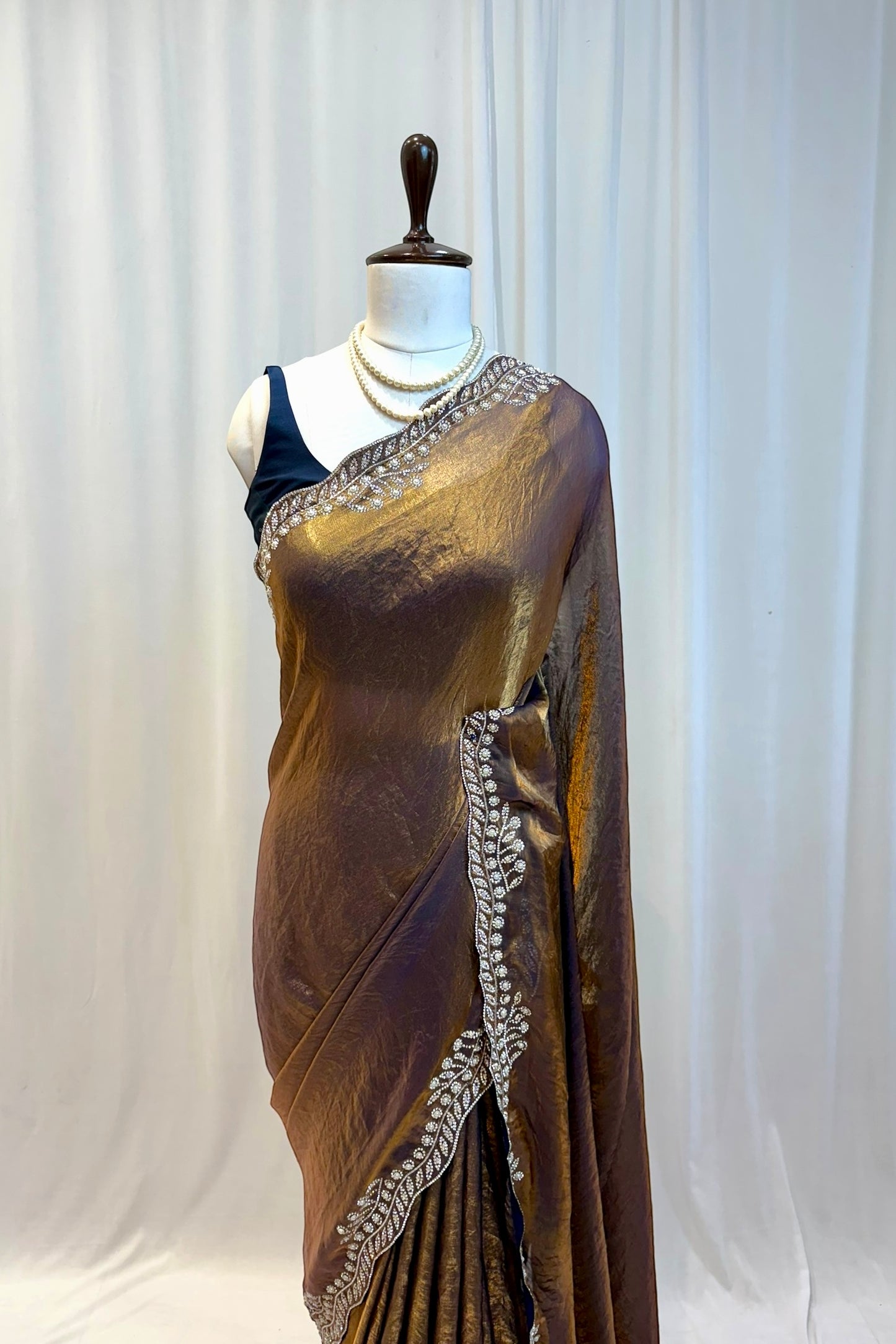 Golden fendy pearl embellished saree