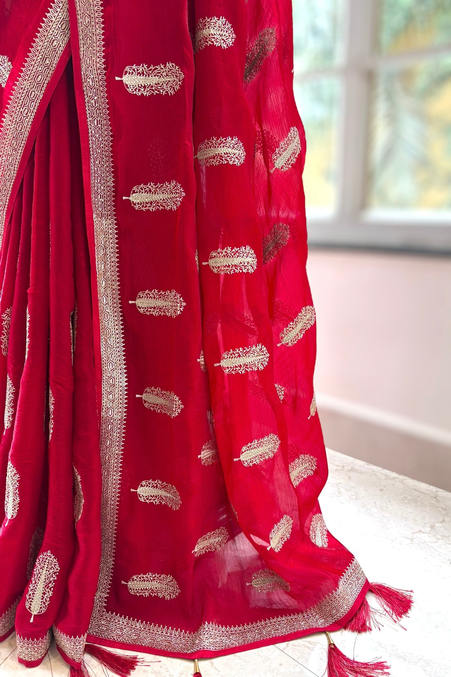 Red embroidered chiffon saree