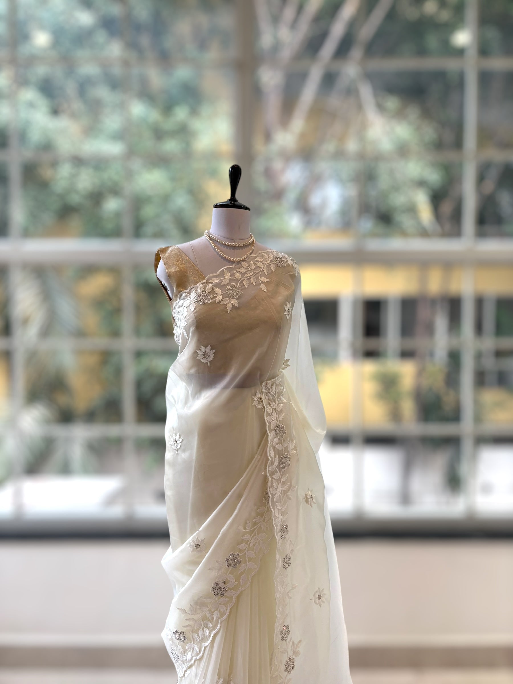 White threadwork embellished scallop saree