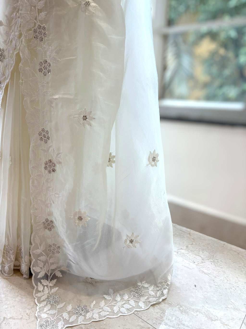 White threadwork embellished scallop saree