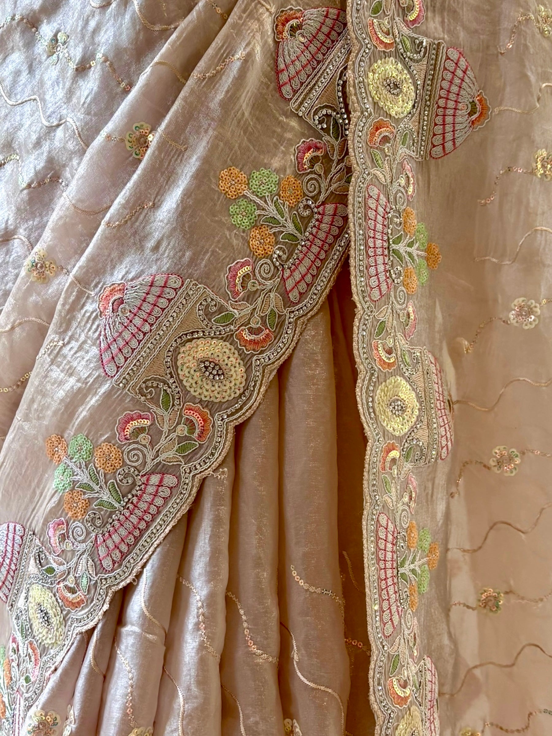 Nude fendy satin embellished saree