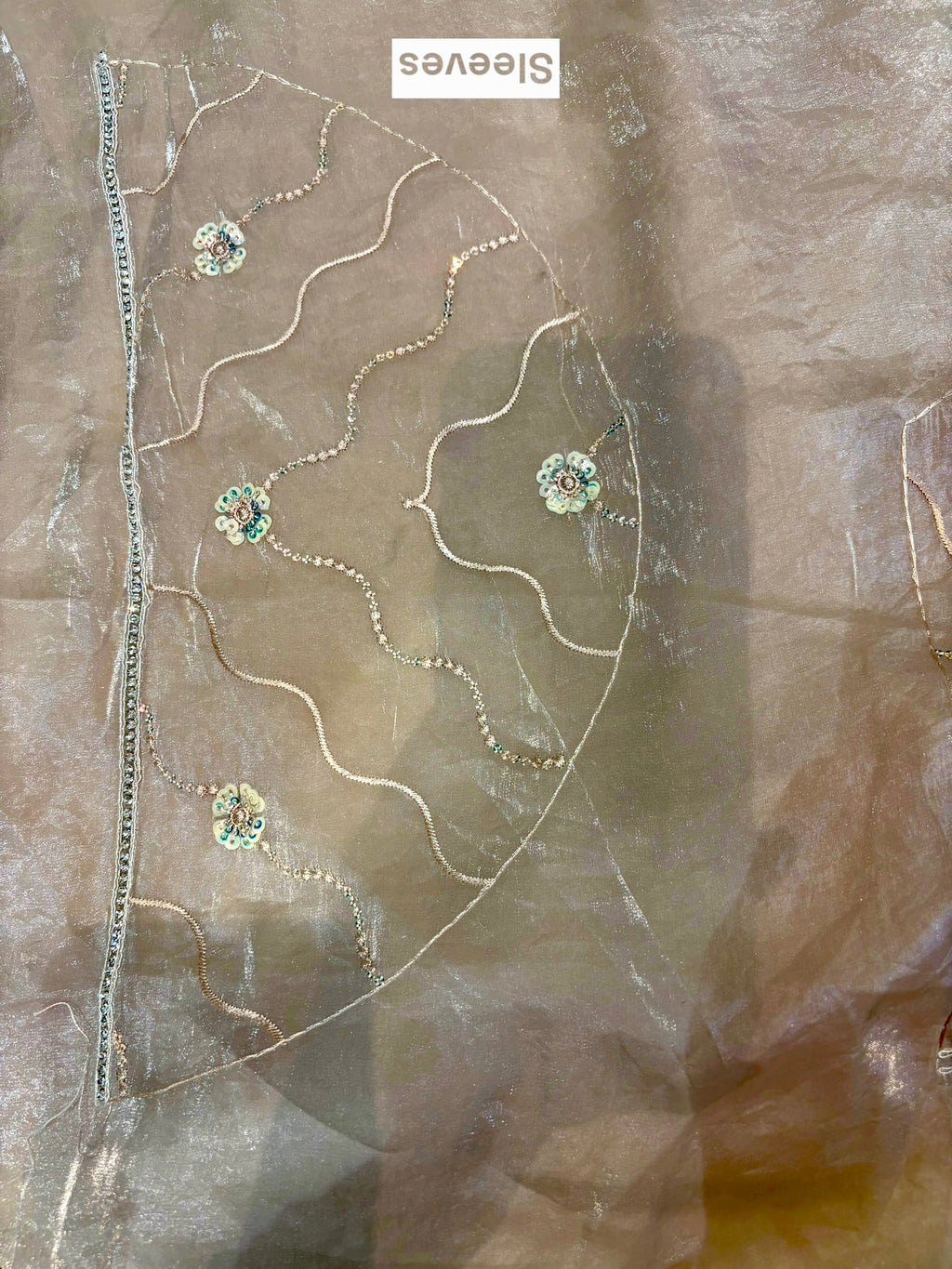 Nude fendy satin embellished saree