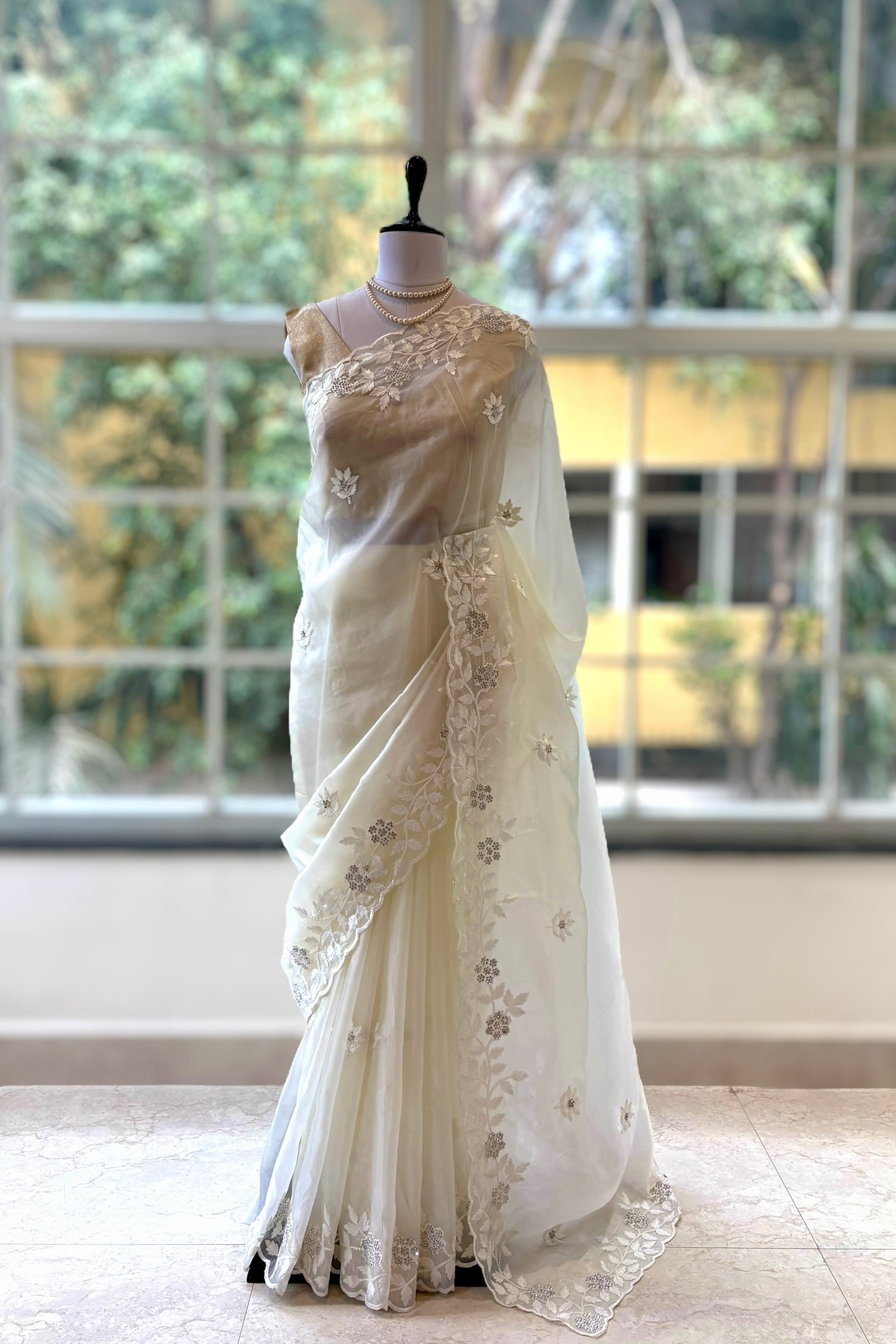 White threadwork embellished scallop saree