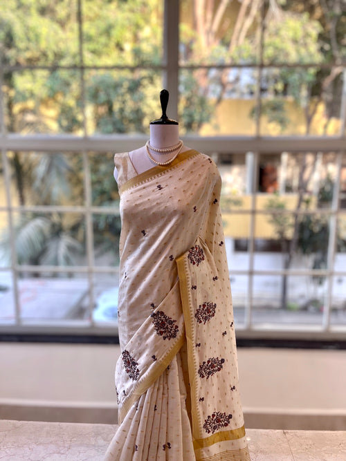 Beige Embroidered zari saree