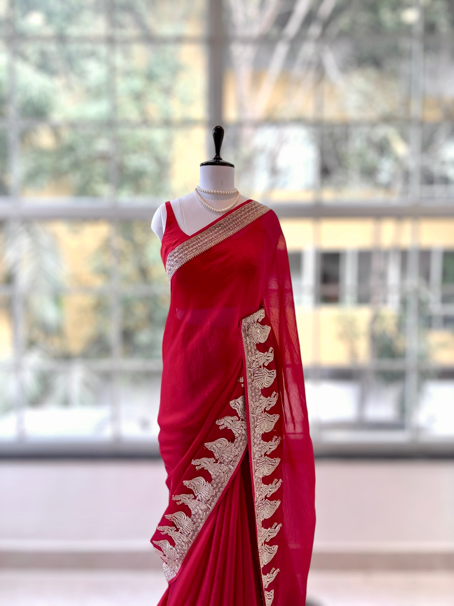 Red embellished fendy satin saree - Figure border