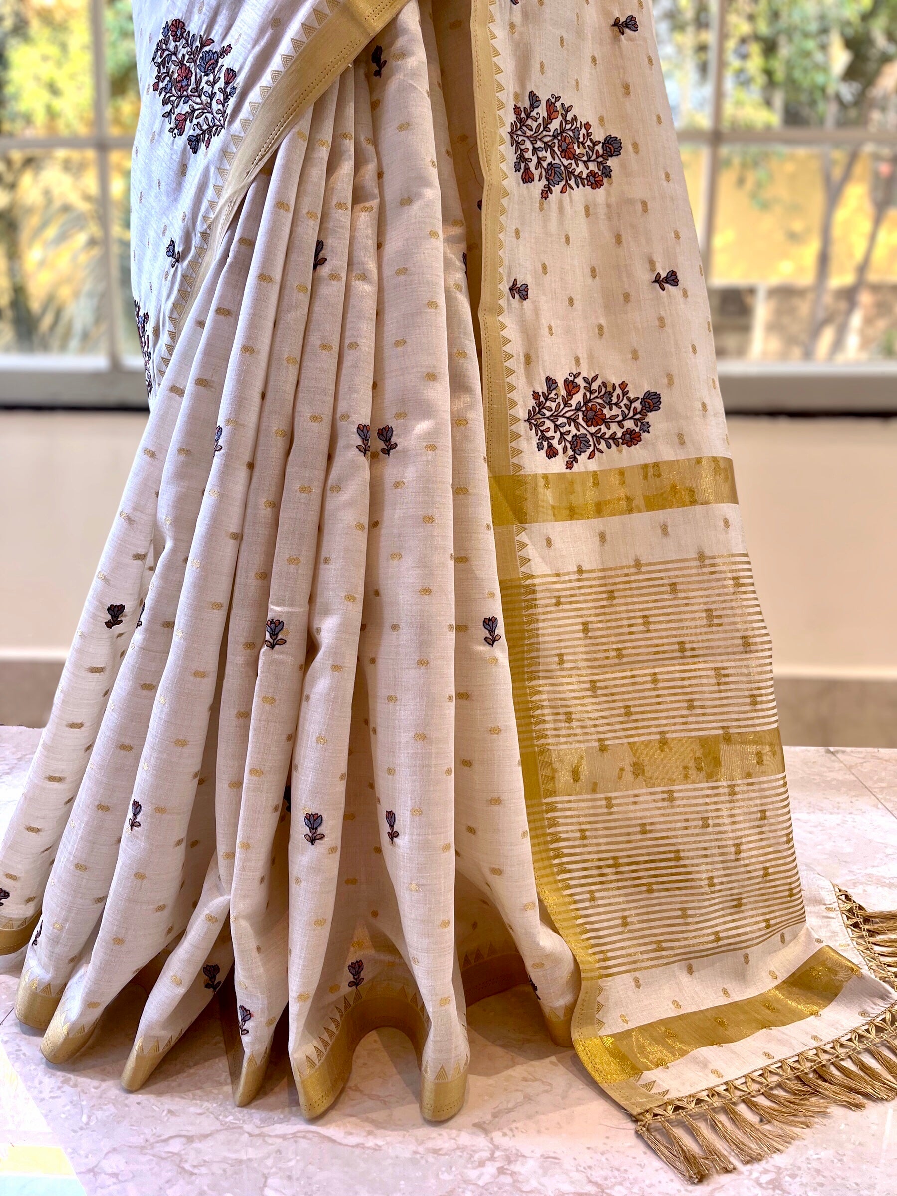 Beige Embroidered zari saree