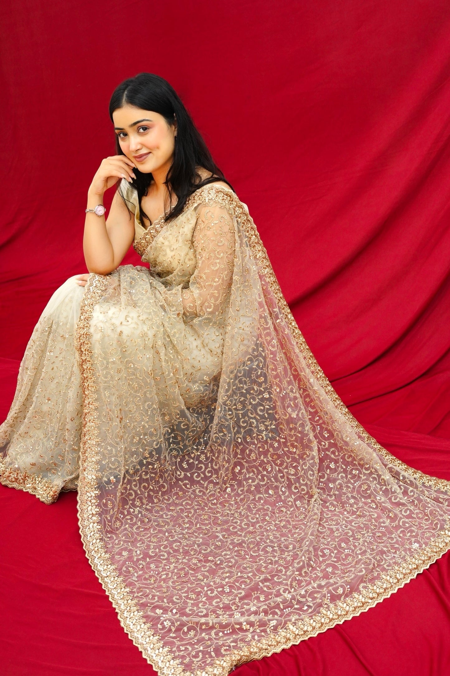 Golden sequins embellished net saree