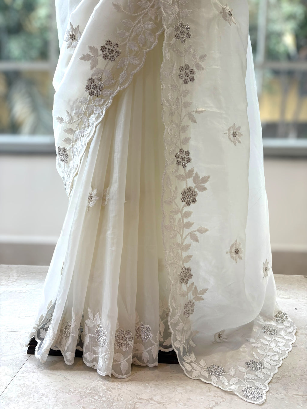 White threadwork embellished scallop saree