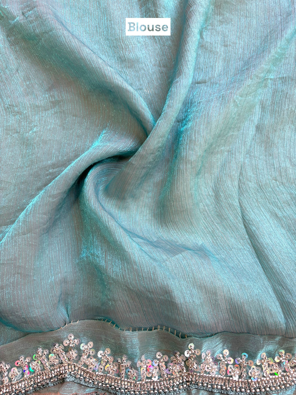 Powder blue shimmer chiffon embellished saree