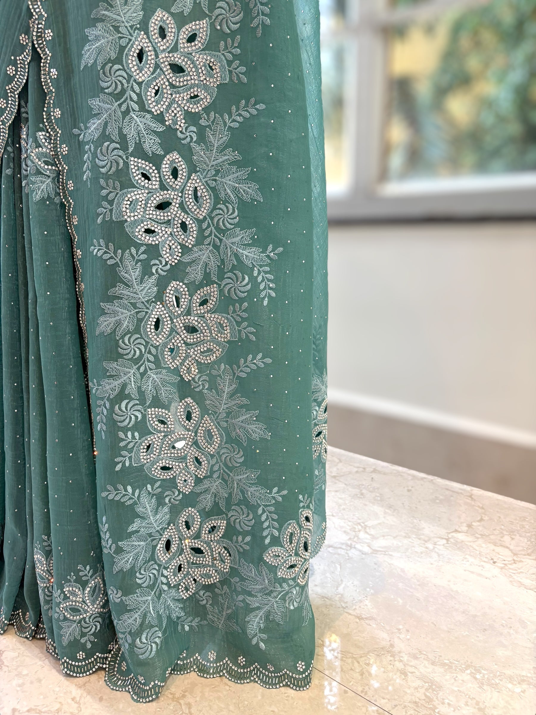 Emerald green shimmer chiffon saree