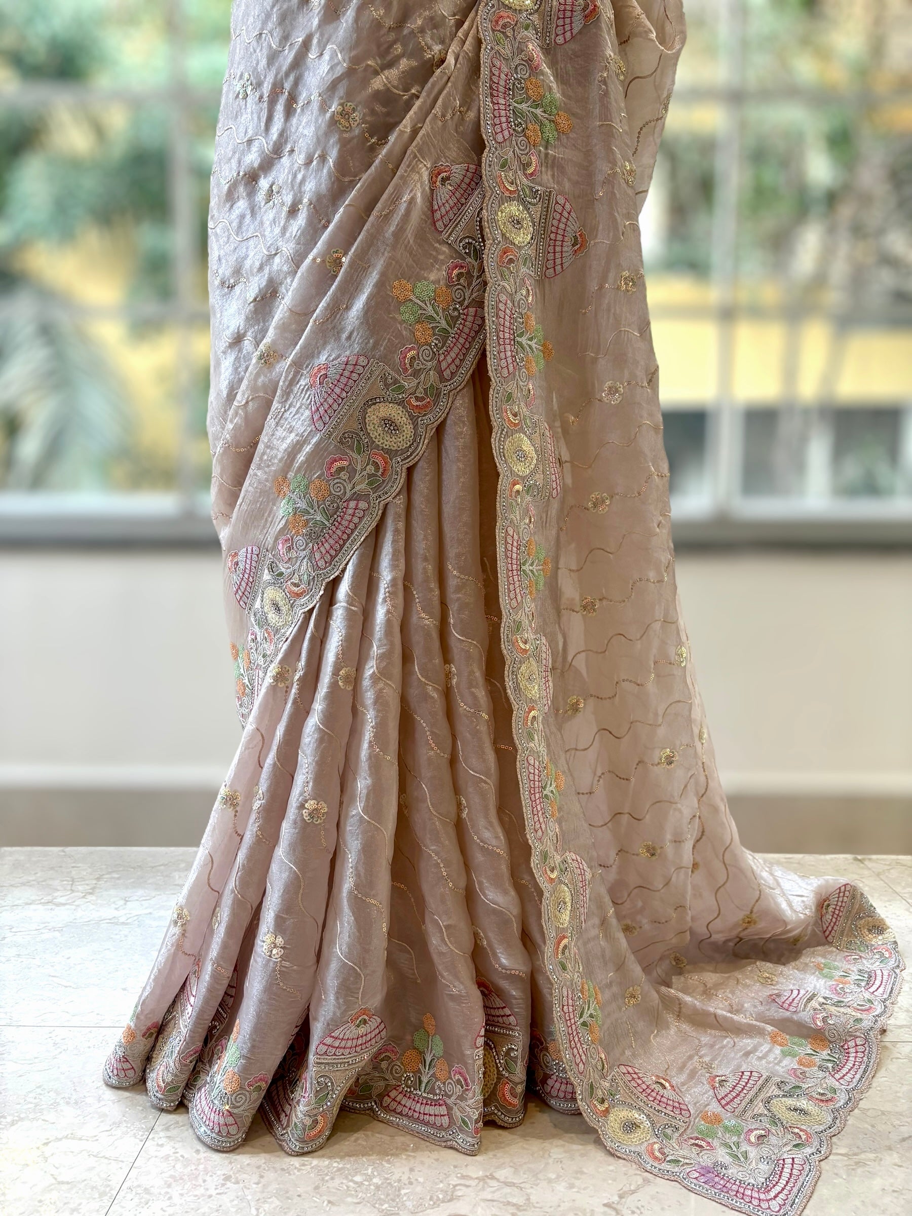 Nude fendy satin embellished saree