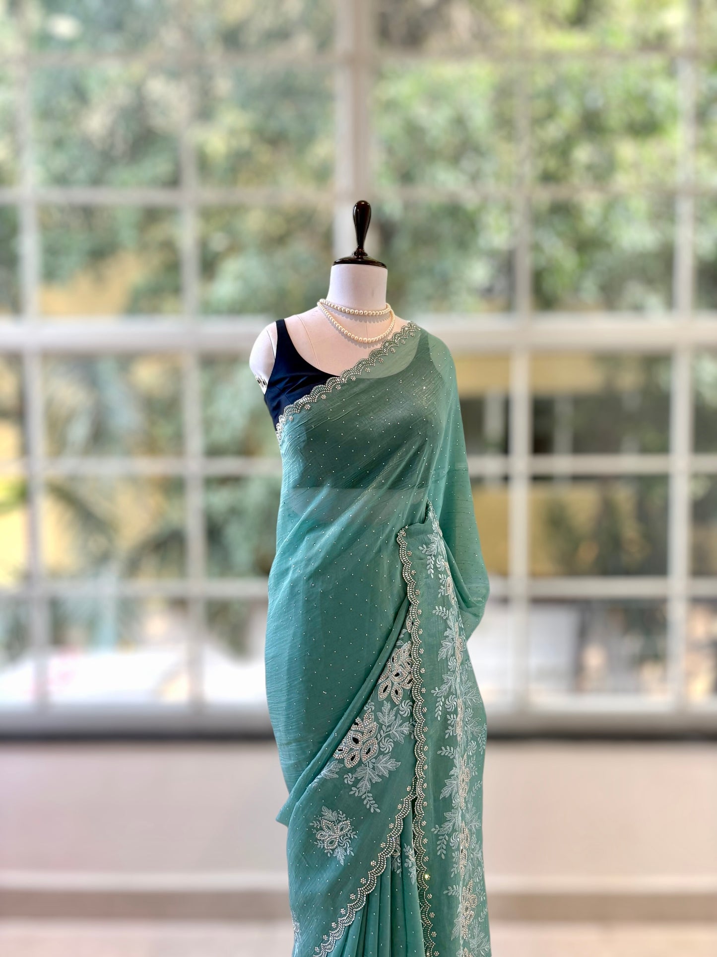 Emerald green shimmer chiffon saree