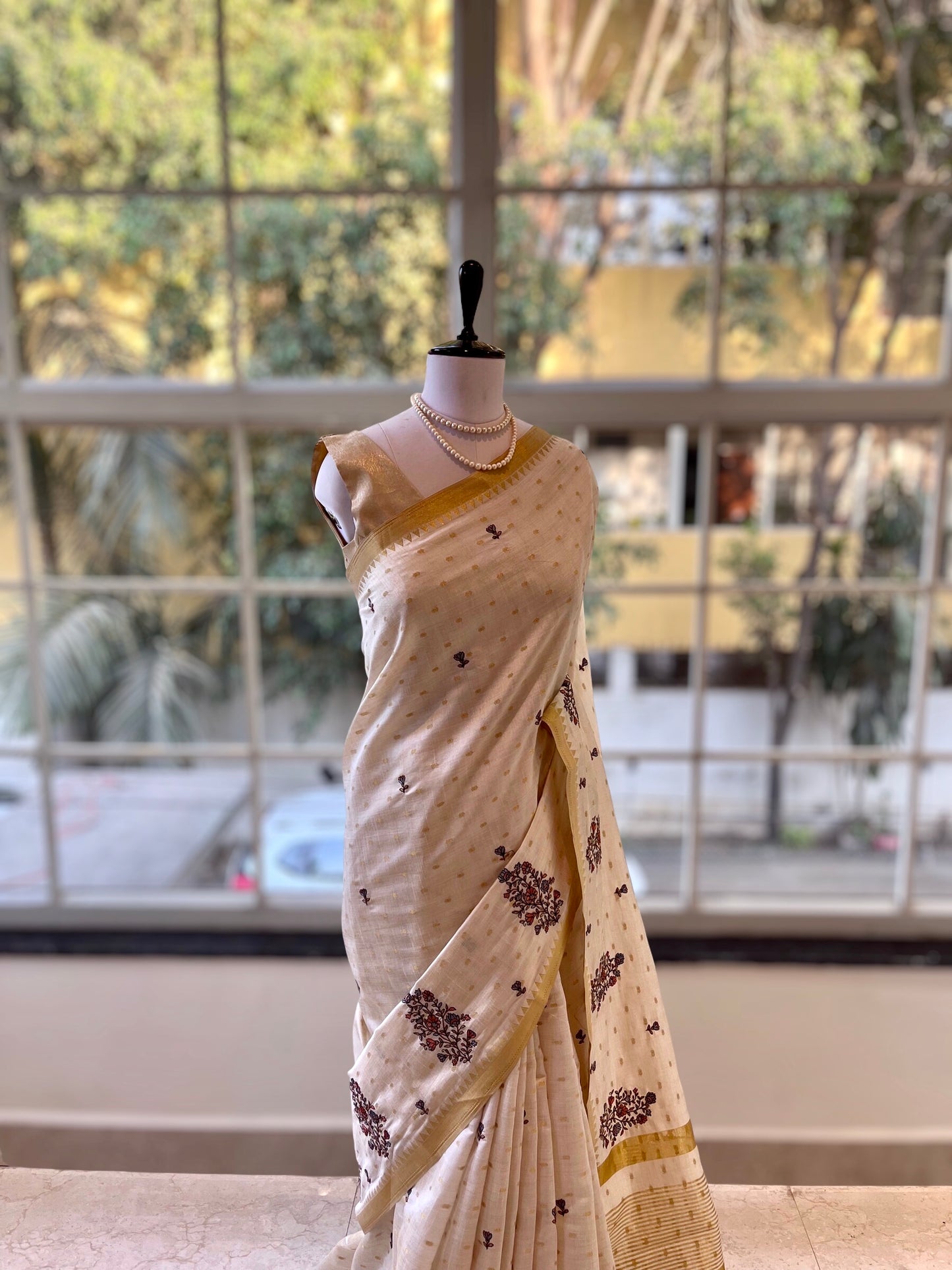 Beige Embroidered zari saree