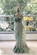 Green embellished organza saree