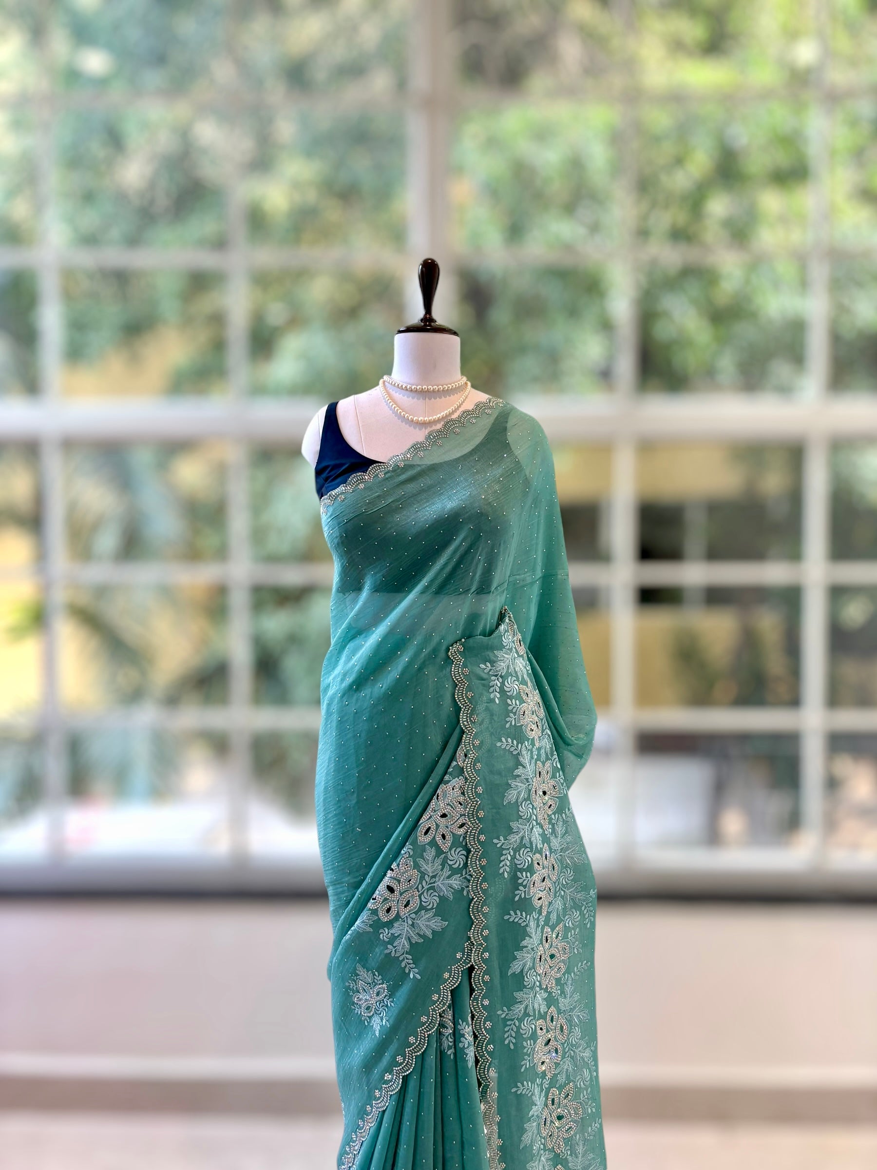 Emerald green shimmer chiffon saree