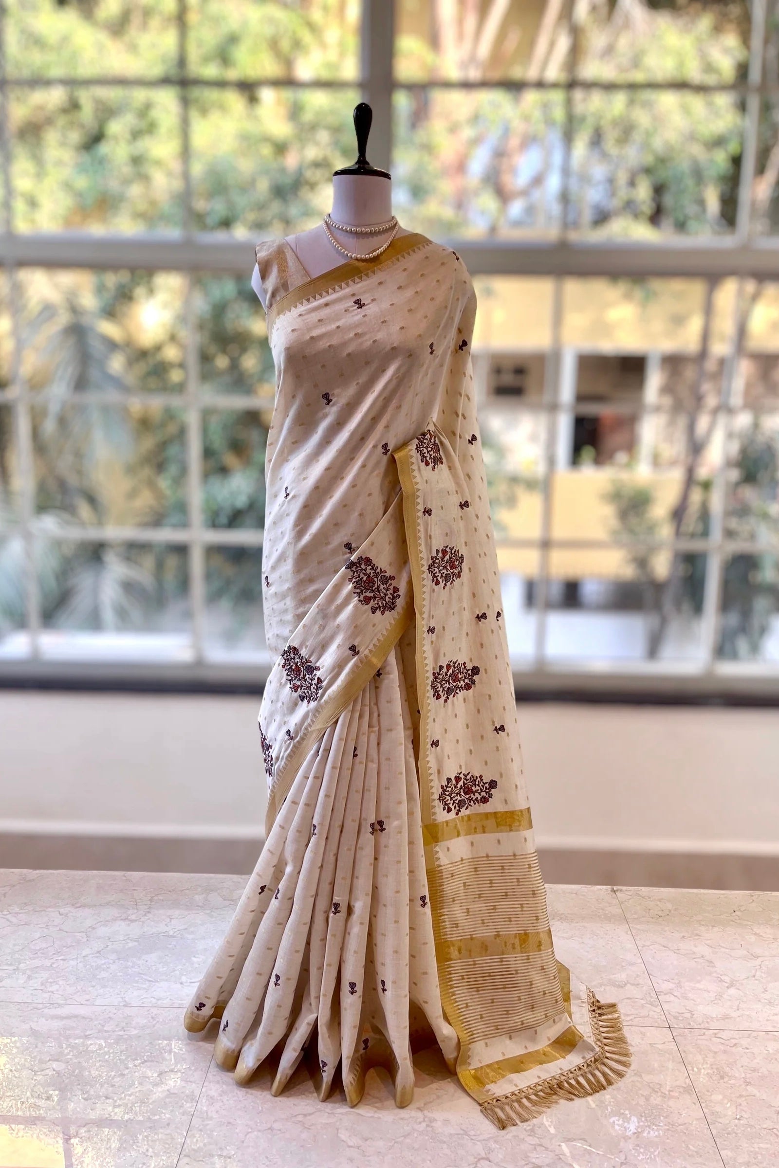 Beige Embroidered zari saree