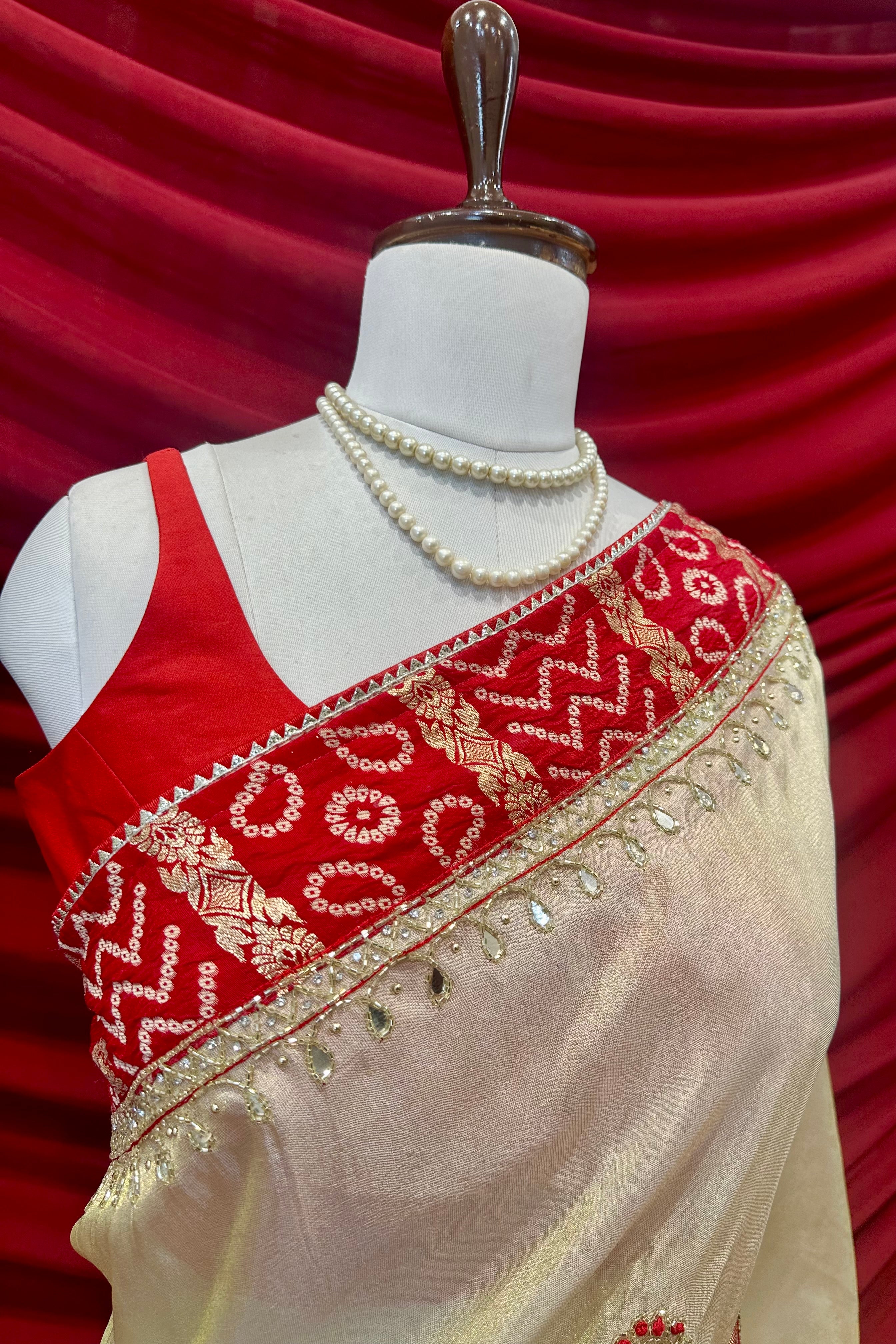 Golden red soft tissue mirror work saree