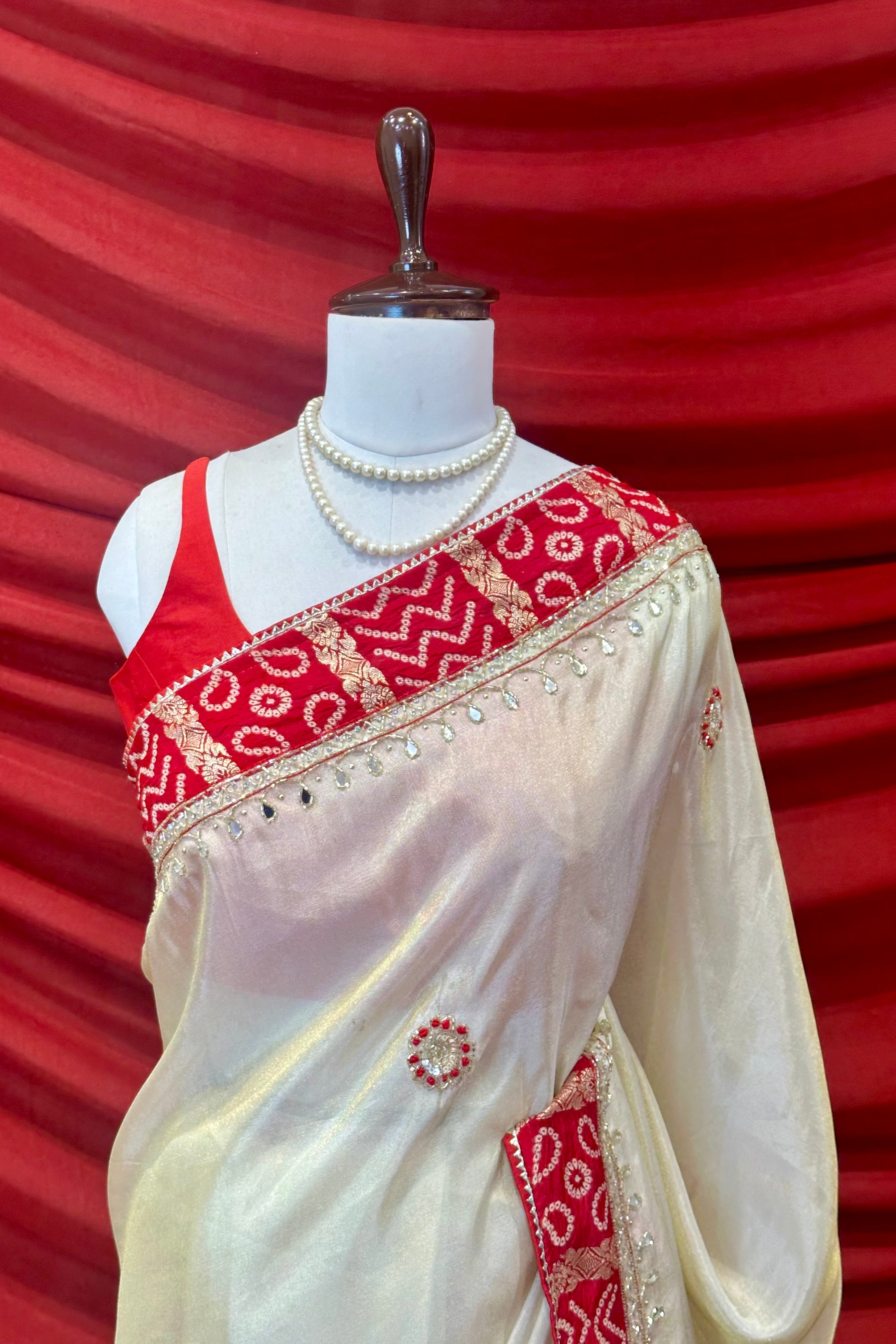 Golden red soft tissue mirror work saree