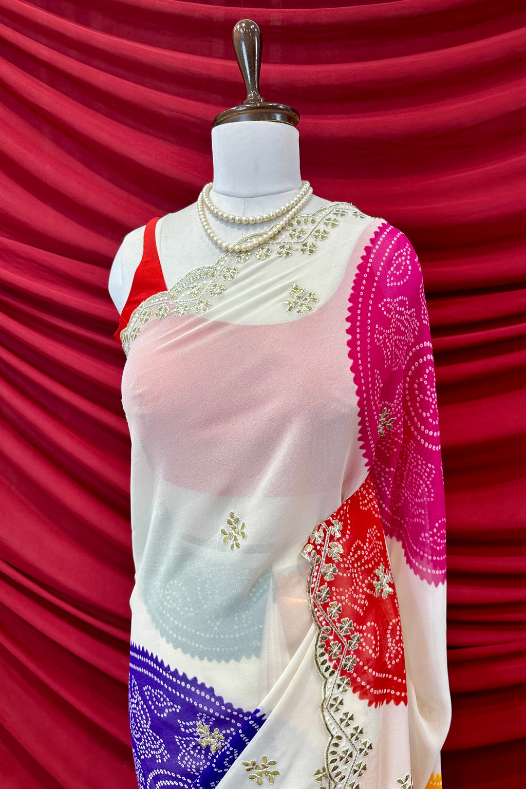 White georgette bandhani print saree