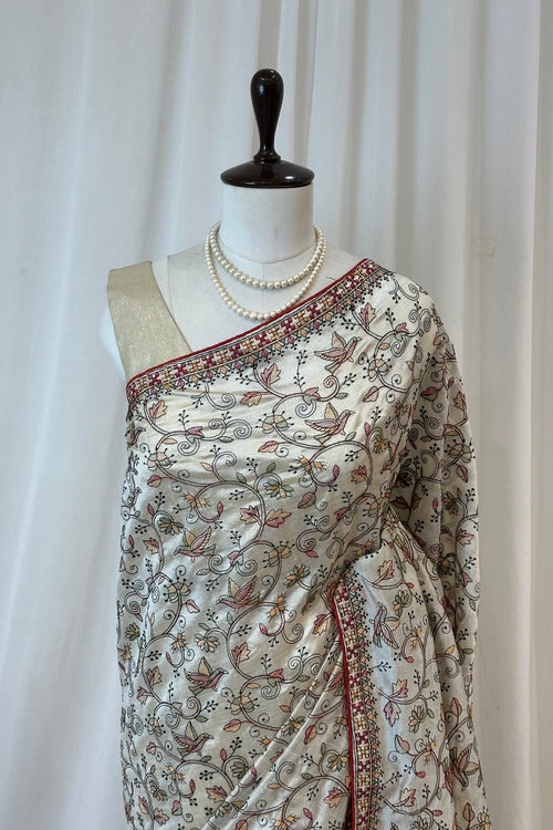 Cream cotton linen embroidered saree