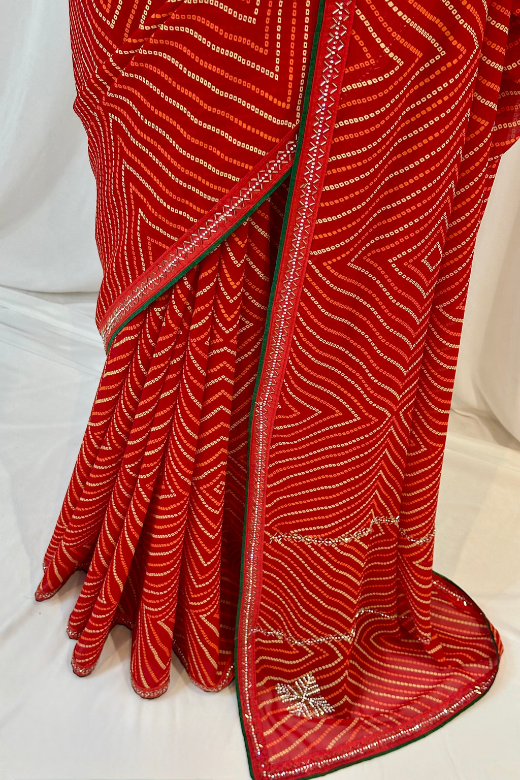 Red bandhani print georgette swarovski saree