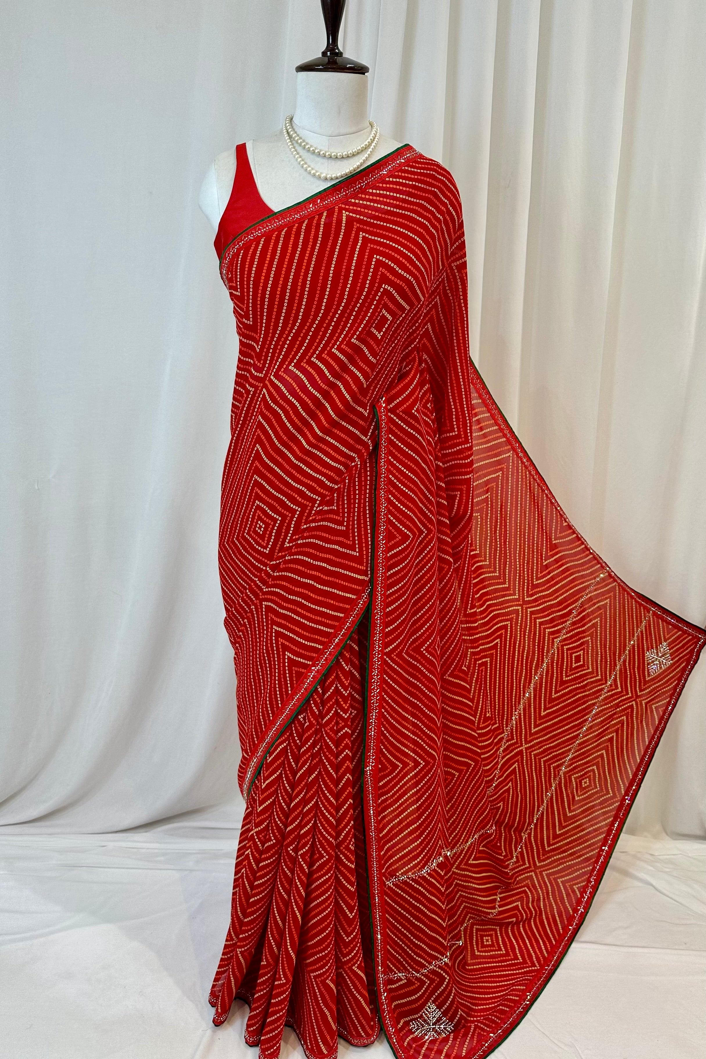 Red bandhani print georgette swarovski saree