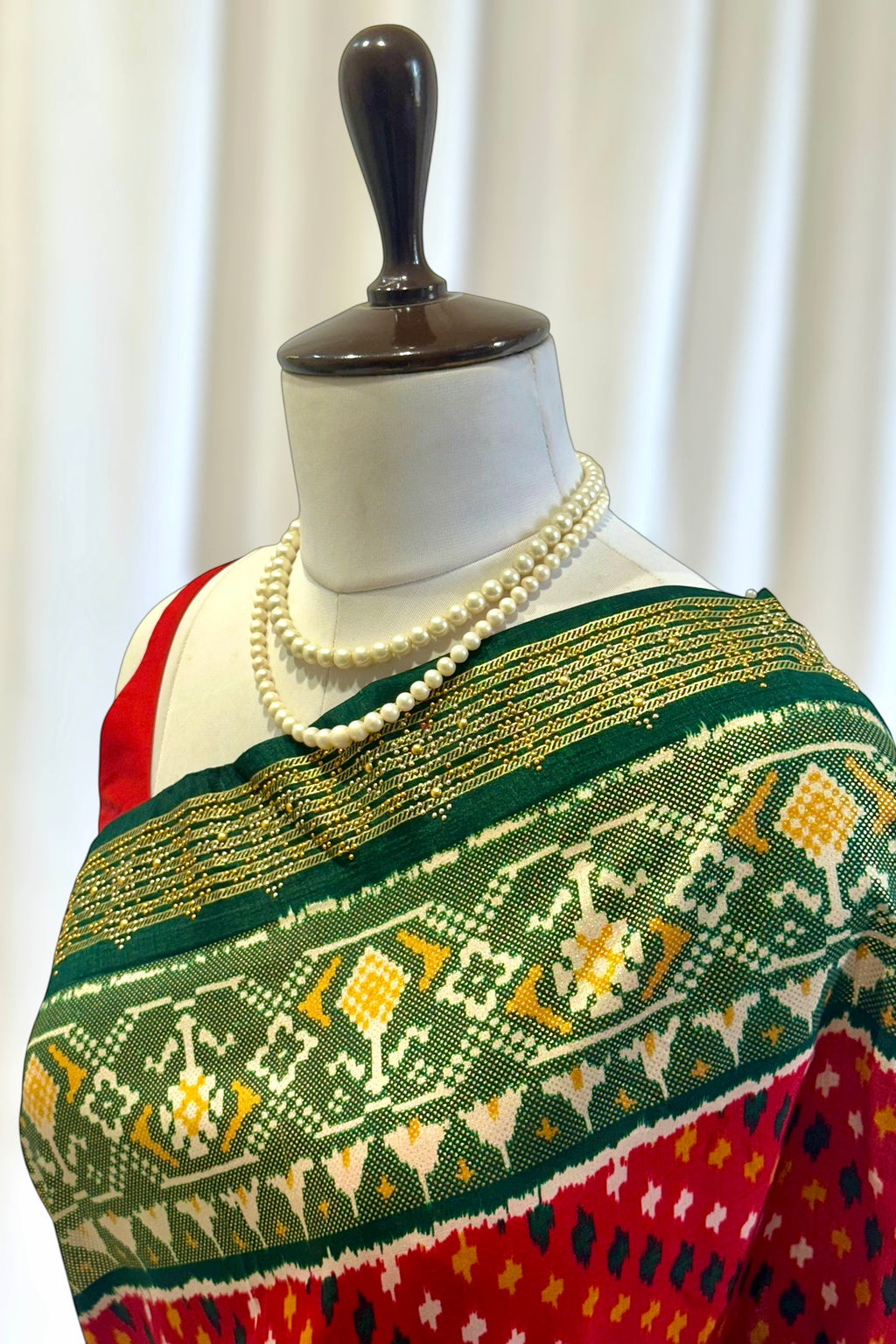 Red green patola saree