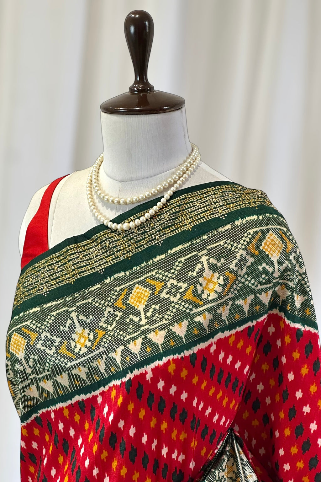 Red green patola saree