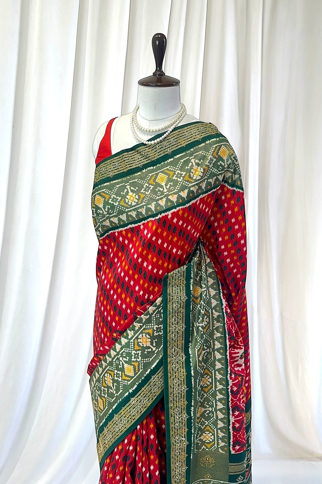 Red green patola saree