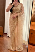 Premium net pearl embellished shimmer saree - Golden