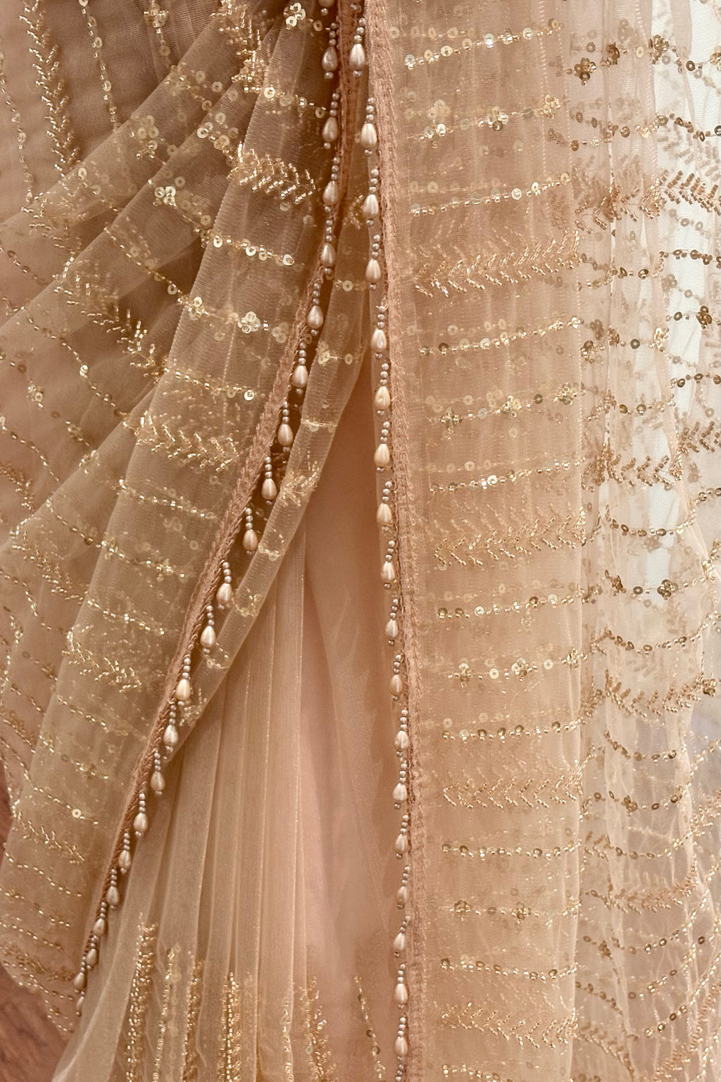 Premium net pearl embellished shimmer saree - Golden