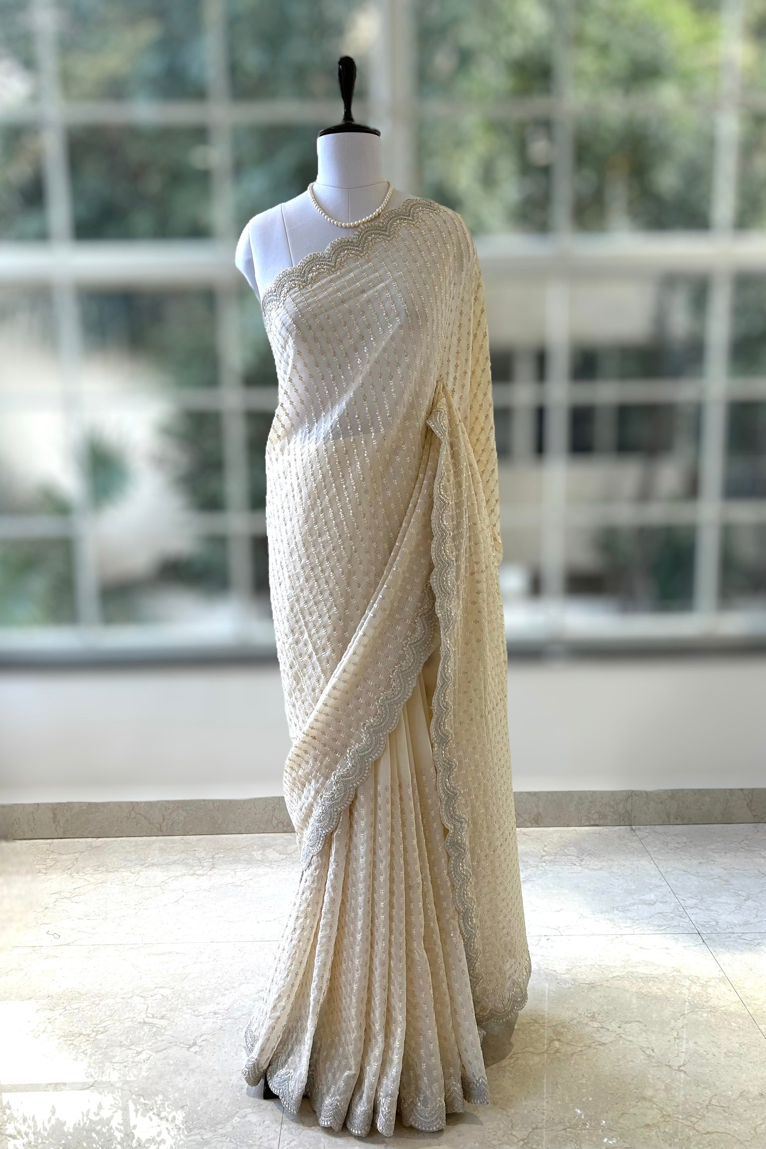 Off white sequins saree