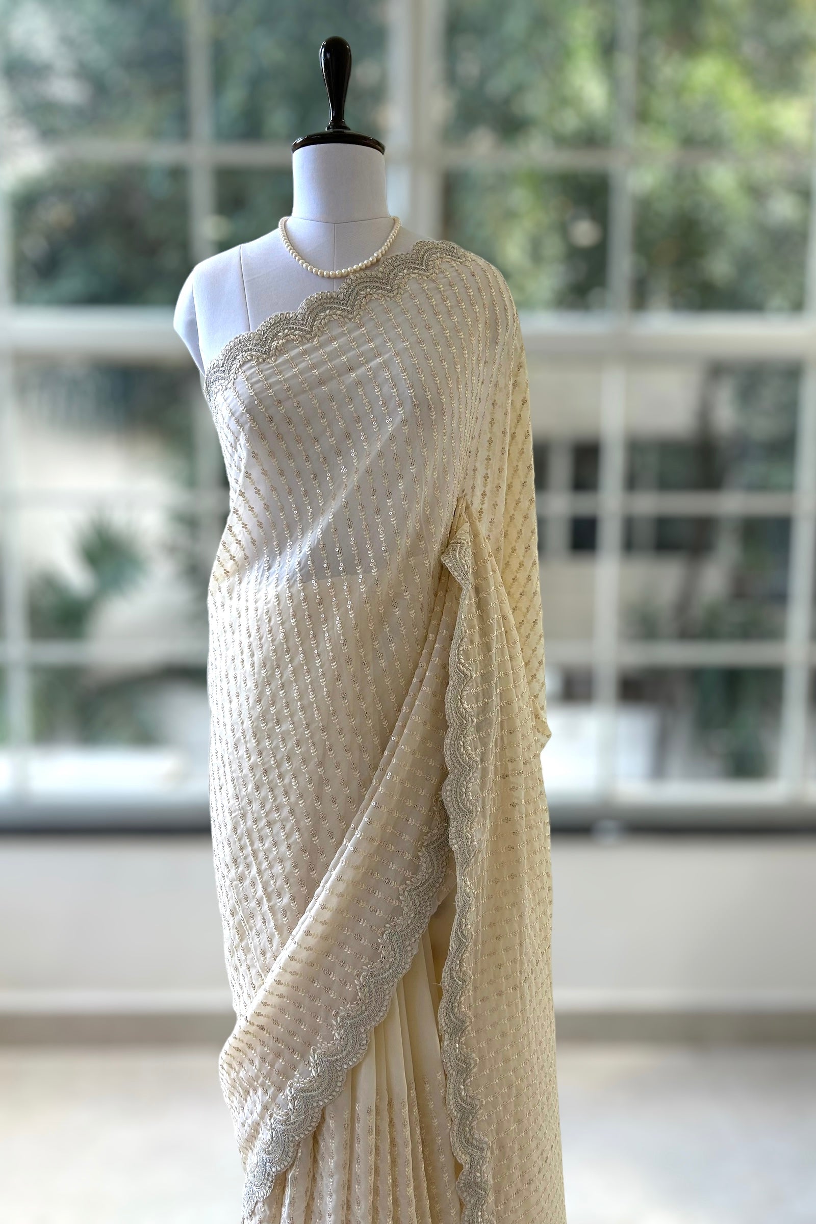 Off white sequins saree