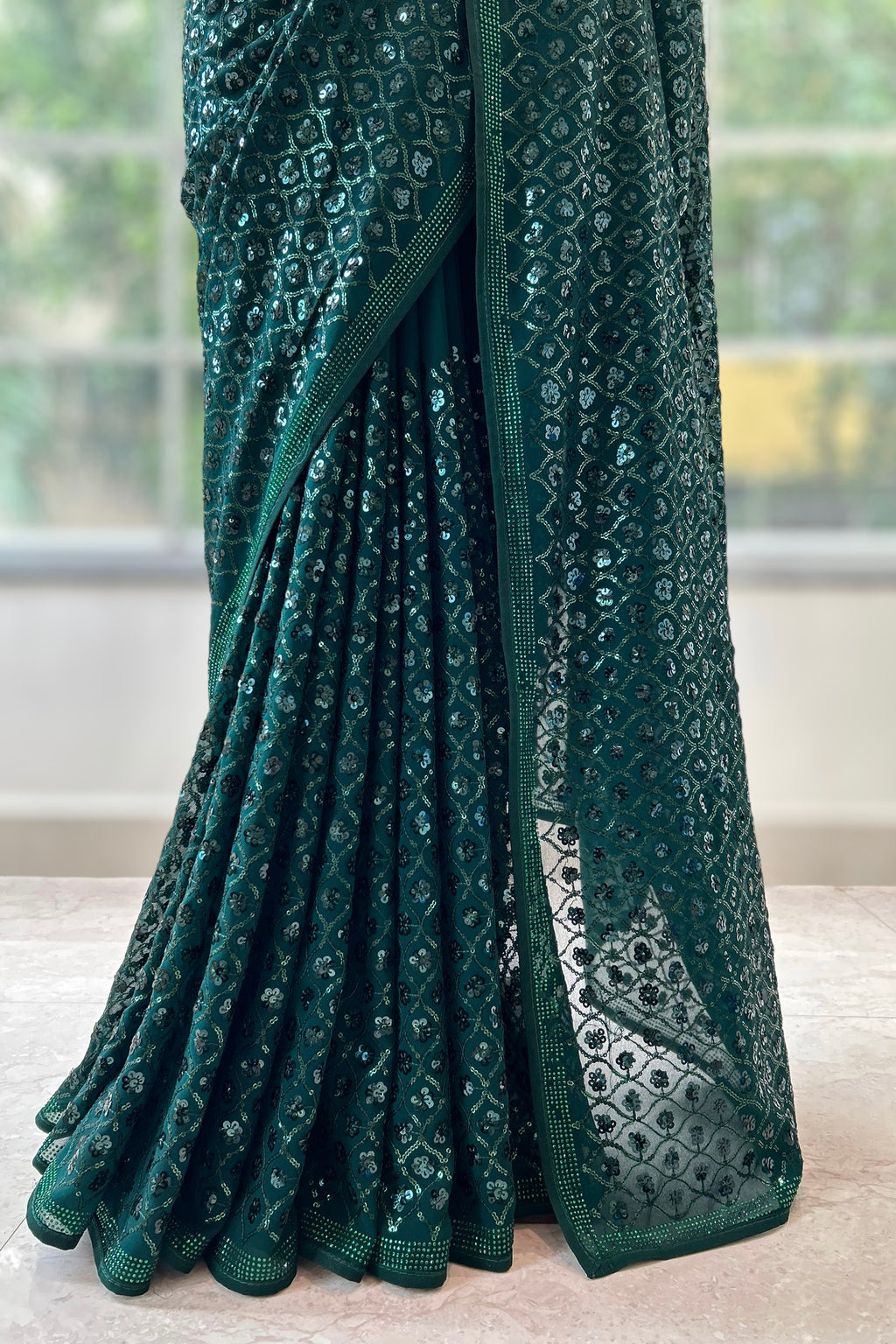 Bottle green georgette sequins saree