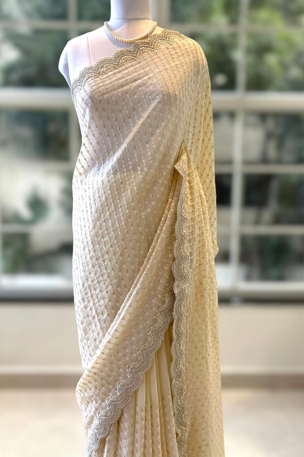 Off white sequins saree
