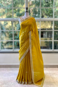 Yellow embroidered soft organza saree