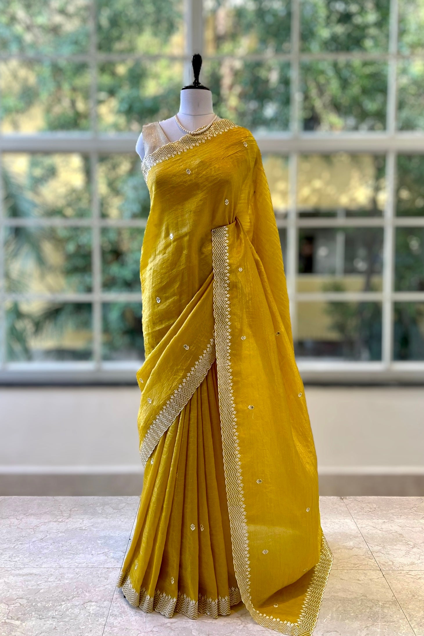 Yellow embroidered soft organza saree