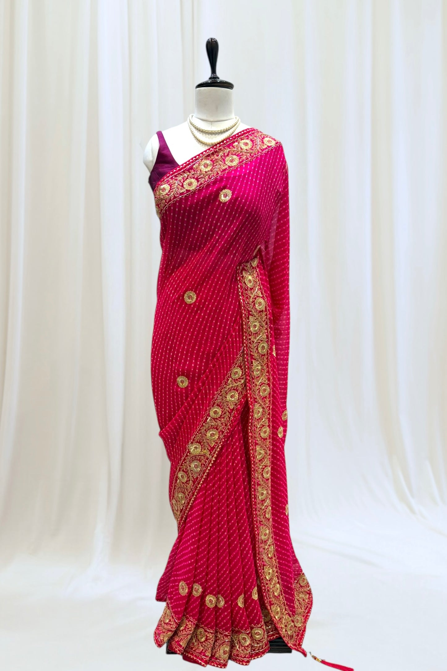 Pink motra zari georgette saree