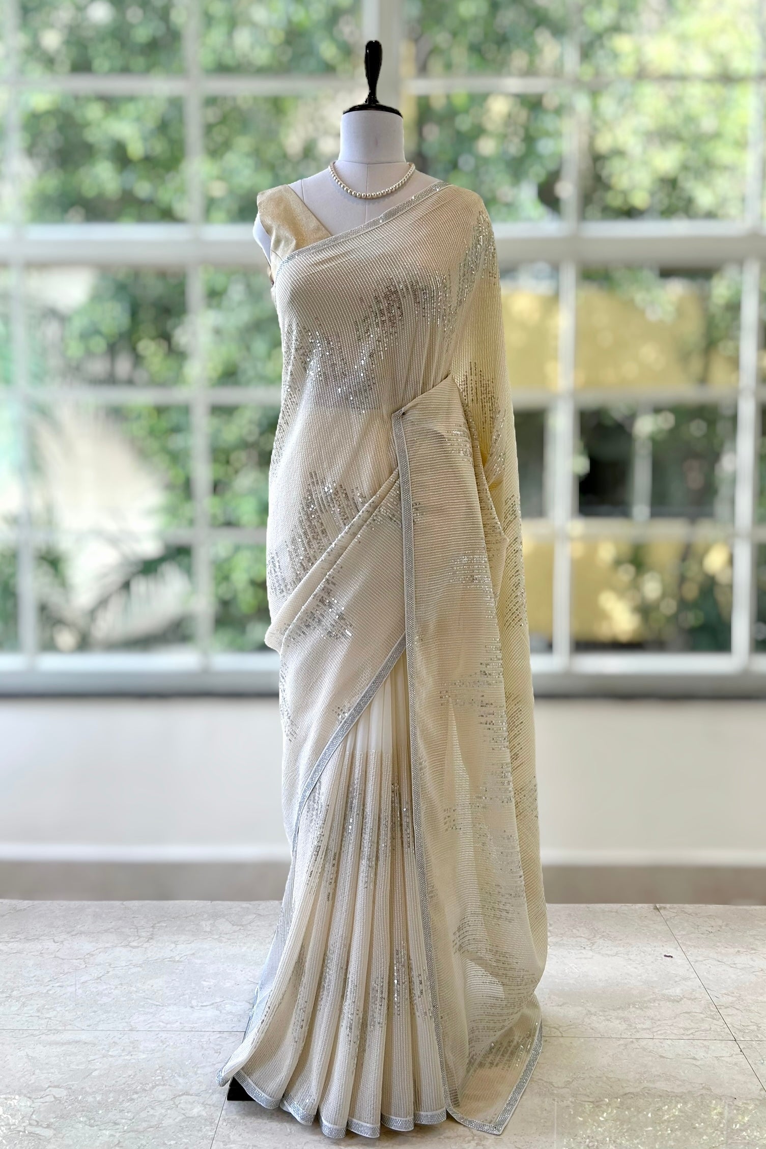 Off white sequins threadwork georgette saree