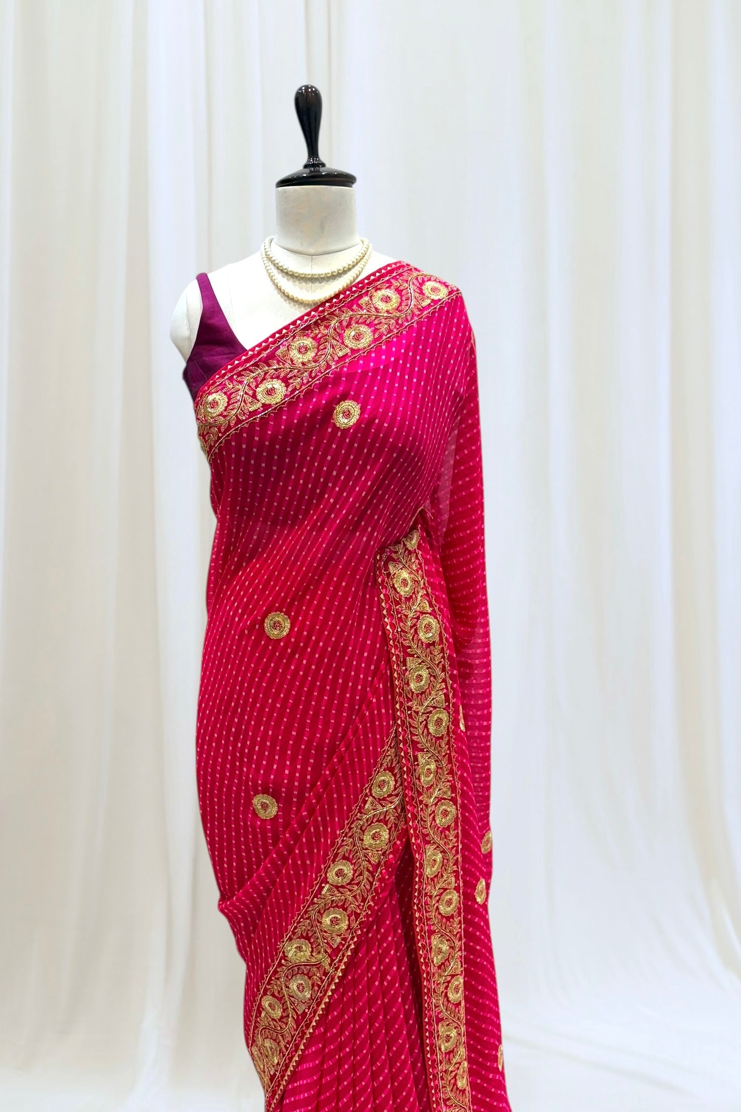 Pink motra zari georgette saree