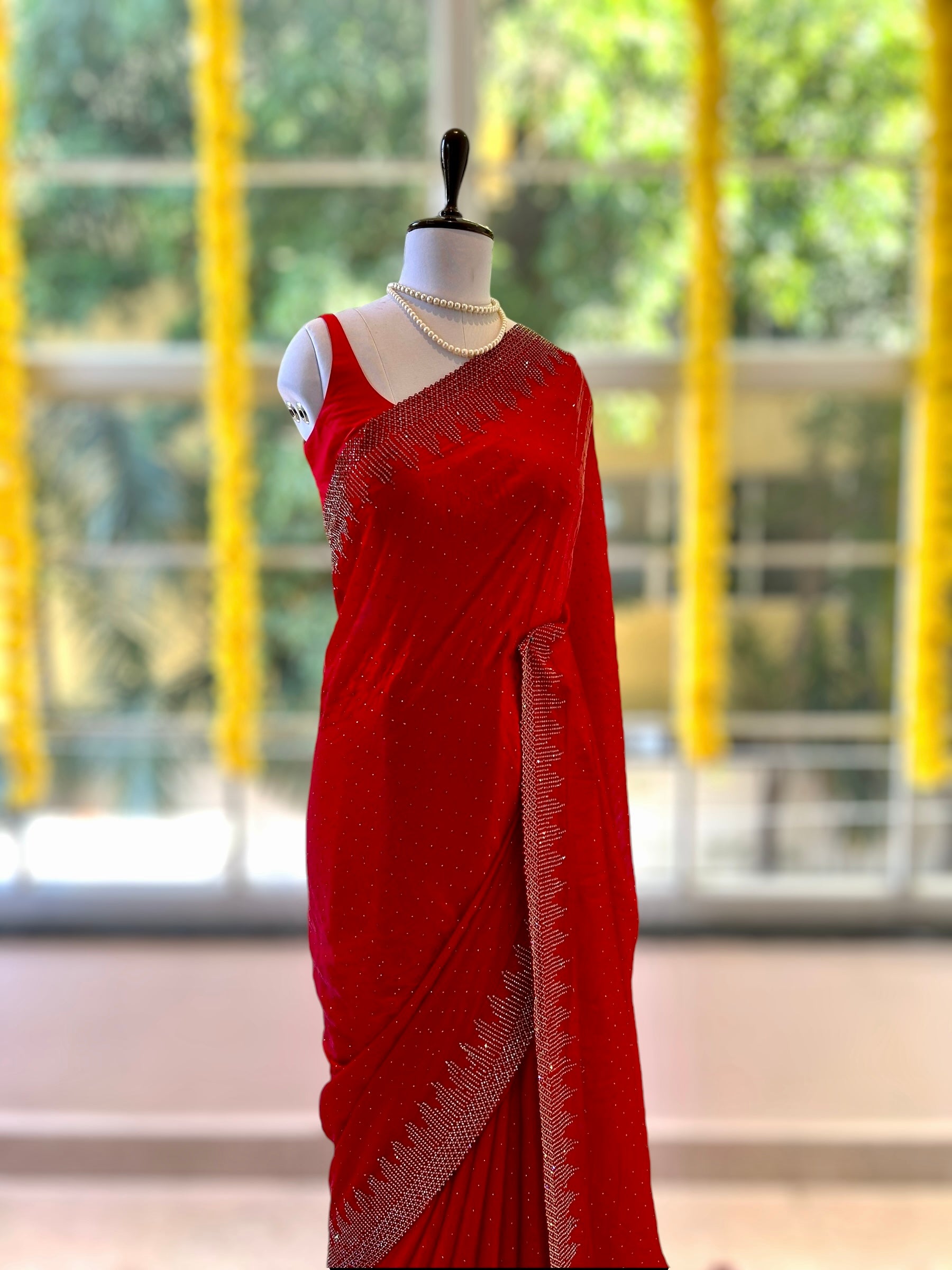 Red shimmer organza embellished saree