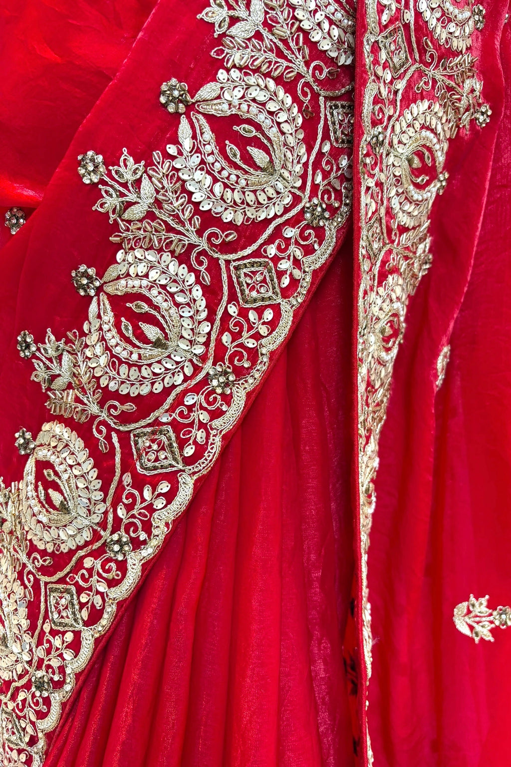 Red fendy satin embellished saree