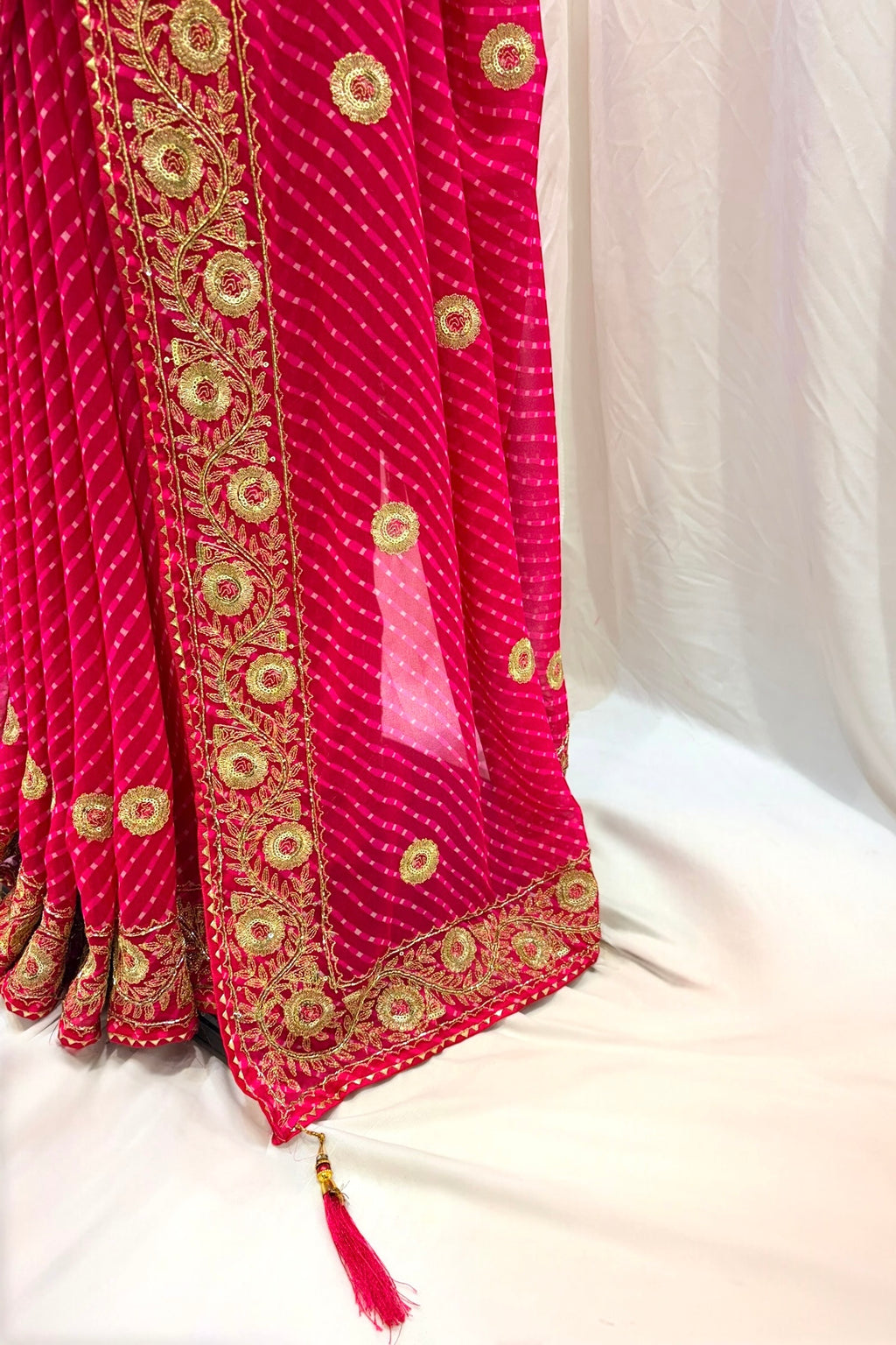 Pink motra zari georgette saree