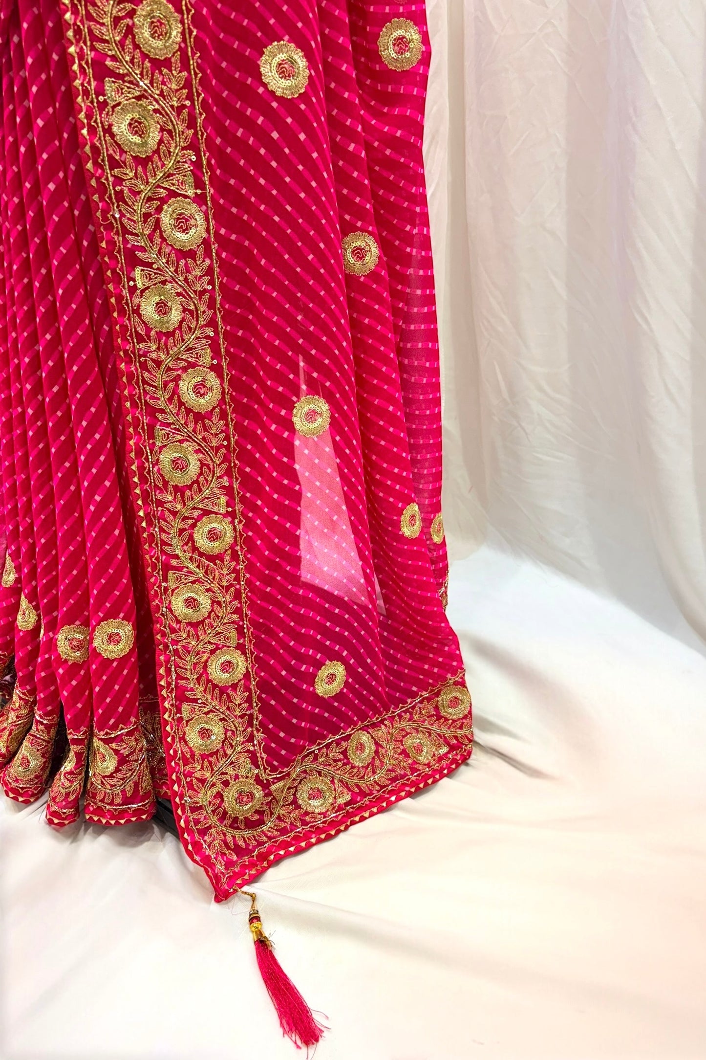 Pink motra zari georgette saree