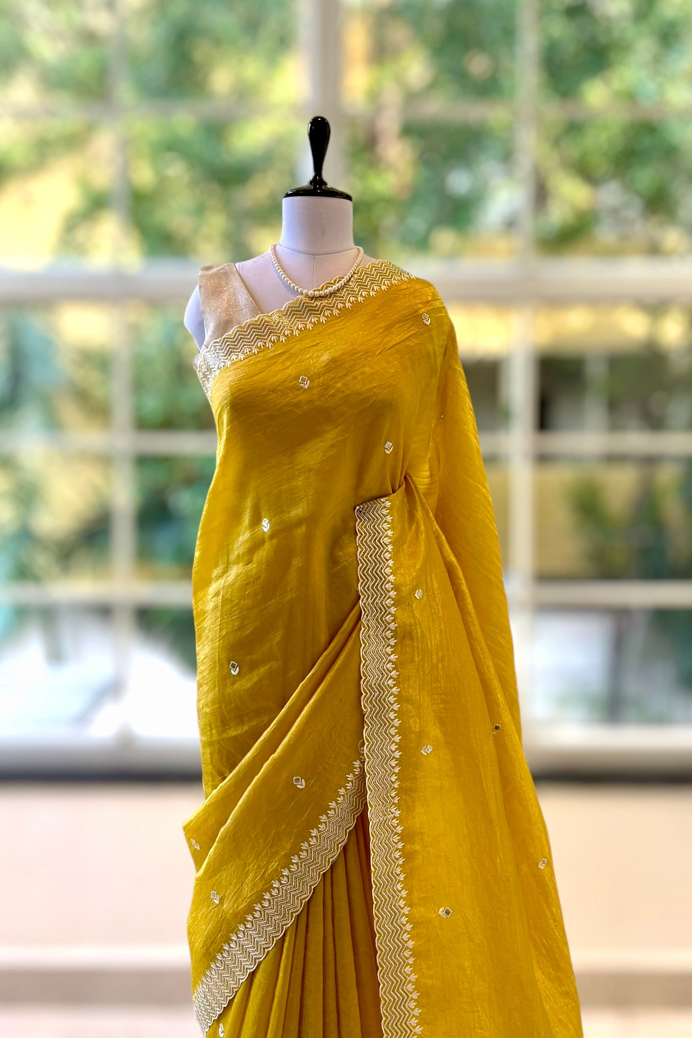 Yellow embroidered soft organza saree