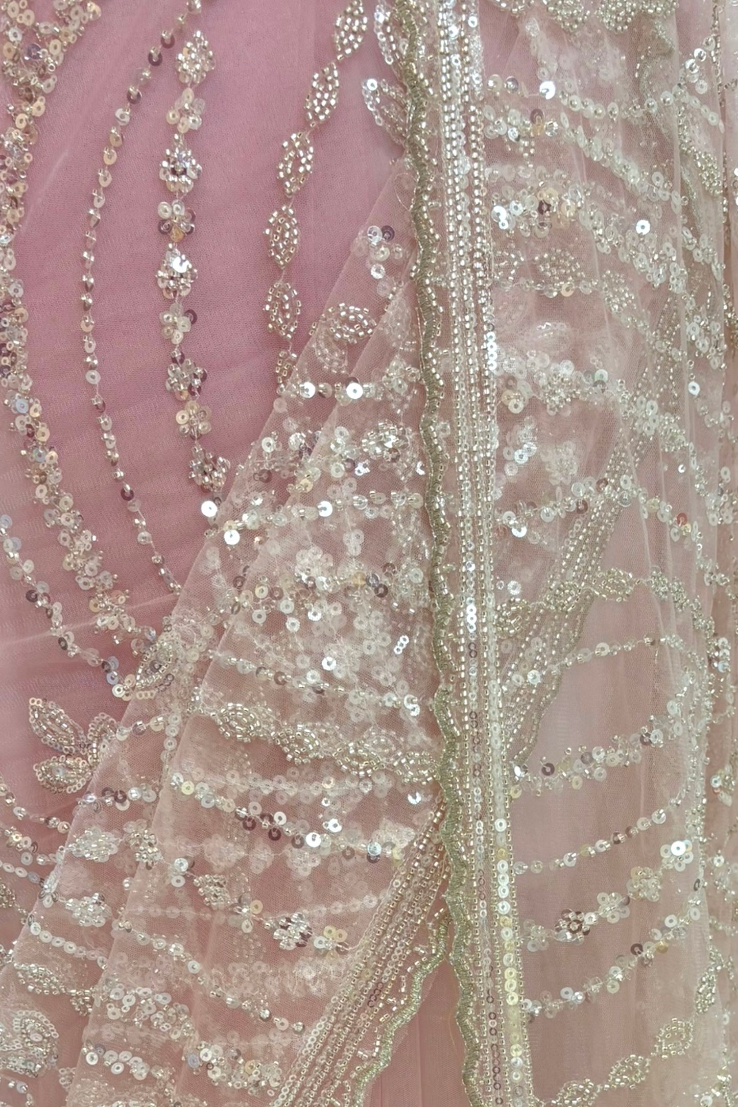 Pink sequins embellished net saree